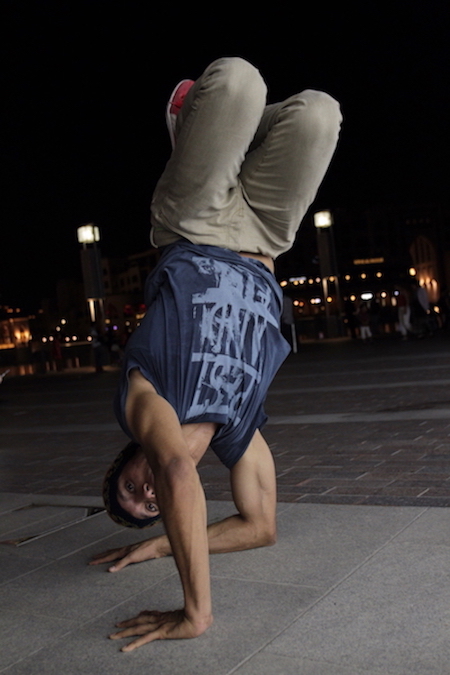 Handstand at night